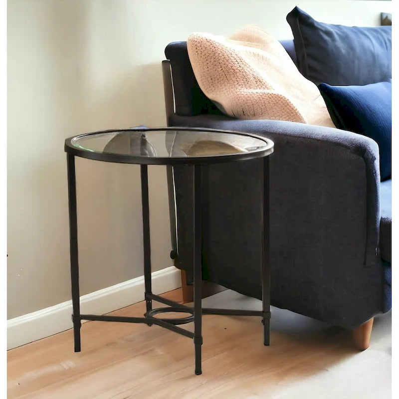 HomeRoots 25 Black And Clear Glass Oval End Table - 25x21x24.75